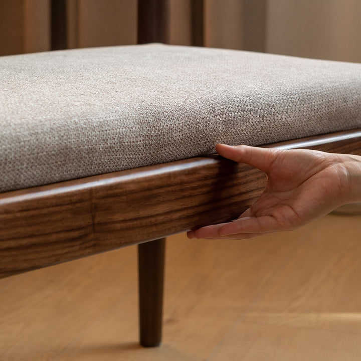 Scandinavian oak wood mixed weave fabric dining bench pillar walnut in close up details.