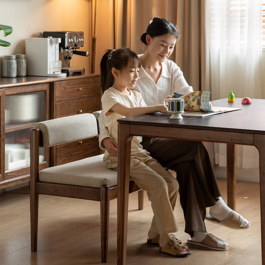 Scandinavian oak wood mixed weave fabric dining bench pillar walnut in panoramic view.