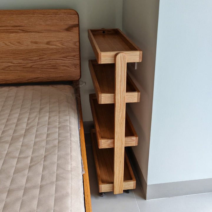 Scandinavian oak wood wheeled trolley side table mira layered structure.