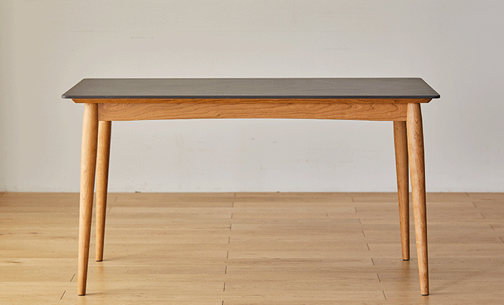 Scandinavian sintered stone dining table green with context.