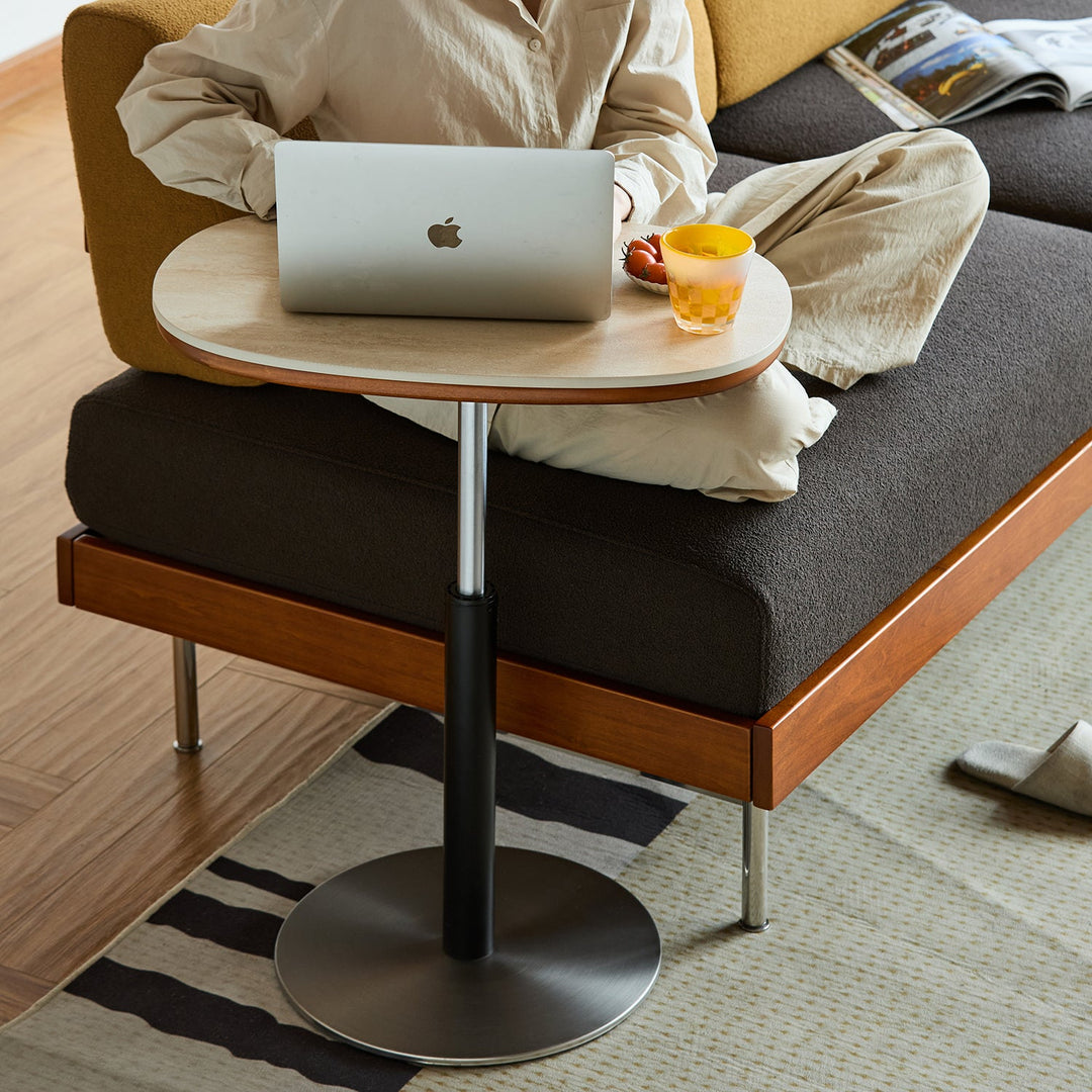 Bauhaus sintered stone height adjustable side table roman in details.