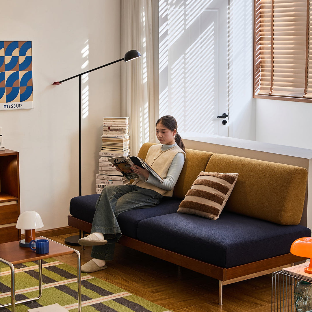 Bauhaus boucle fabric 3 seater sofa mies in still life.
