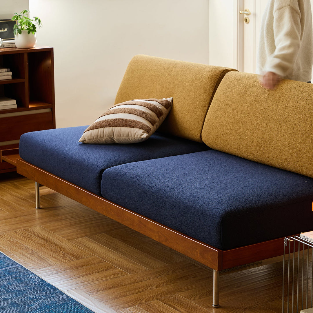 Bauhaus boucle fabric 3 seater sofa mies in panoramic view.