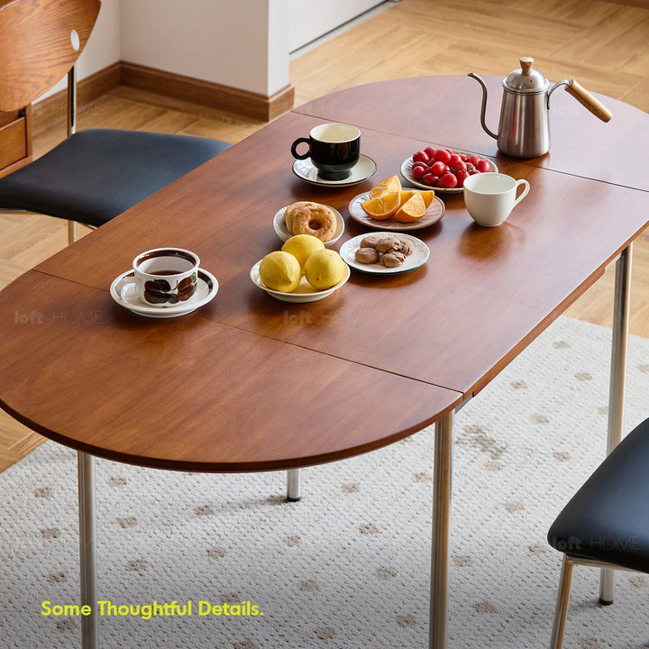 Bauhaus boxwood extendable oval dining table season detail 13.