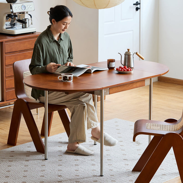 Bauhaus boxwood extendable oval dining table season primary product view.