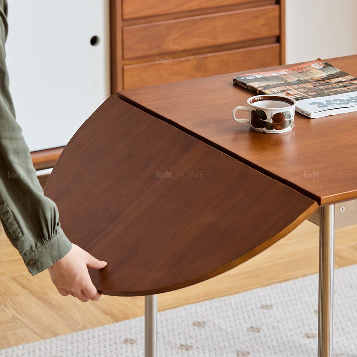 Bauhaus boxwood extendable oval dining table season detail 19.