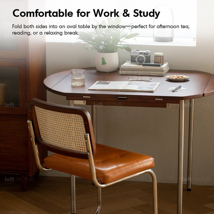 Vintage boxwood extendable round dining table season in still life.