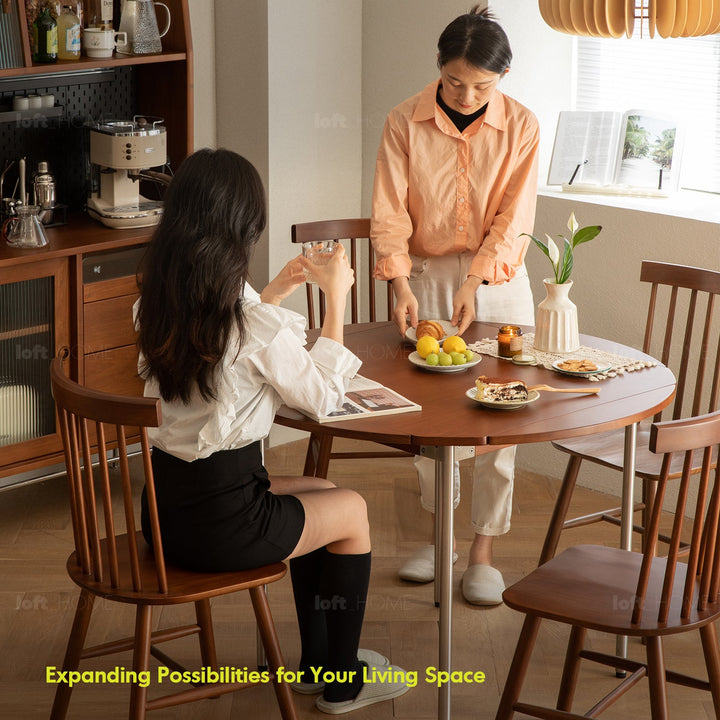 Vintage boxwood extendable round dining table season in real life style.