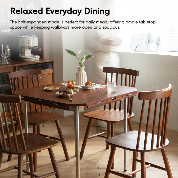 Vintage boxwood extendable round dining table season in close up details.