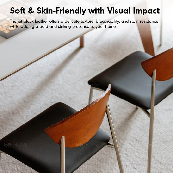 Bauhaus boxwood microfiber leather dining chair bird in still life.