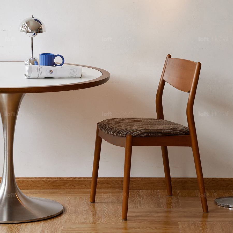 Bauhaus boxwood mix weave fabric cushion stackable dining chair truffle primary product view.