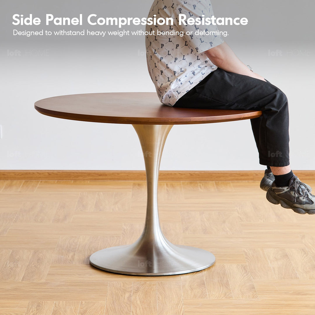 Bauhaus boxwood stainless steel round dining table tulip detail 1.