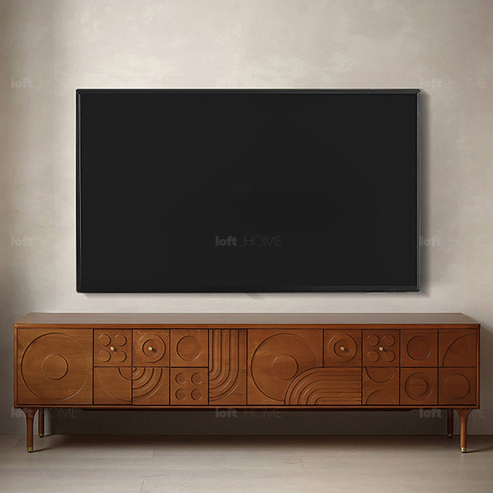 Vintage boxwood tv console madrid in panoramic view.