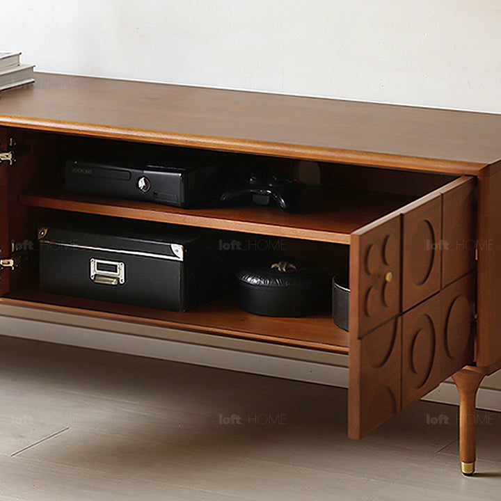 Vintage boxwood tv console madrid in still life.