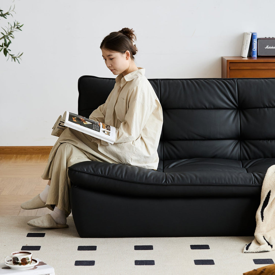 Bauhaus microfiber leather 3 seater sofa bed lie flat in panoramic view.