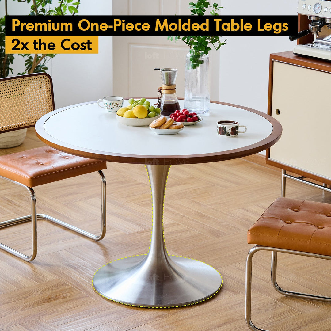 Vintage sintered stone stainless steel round dining table tulip with context.