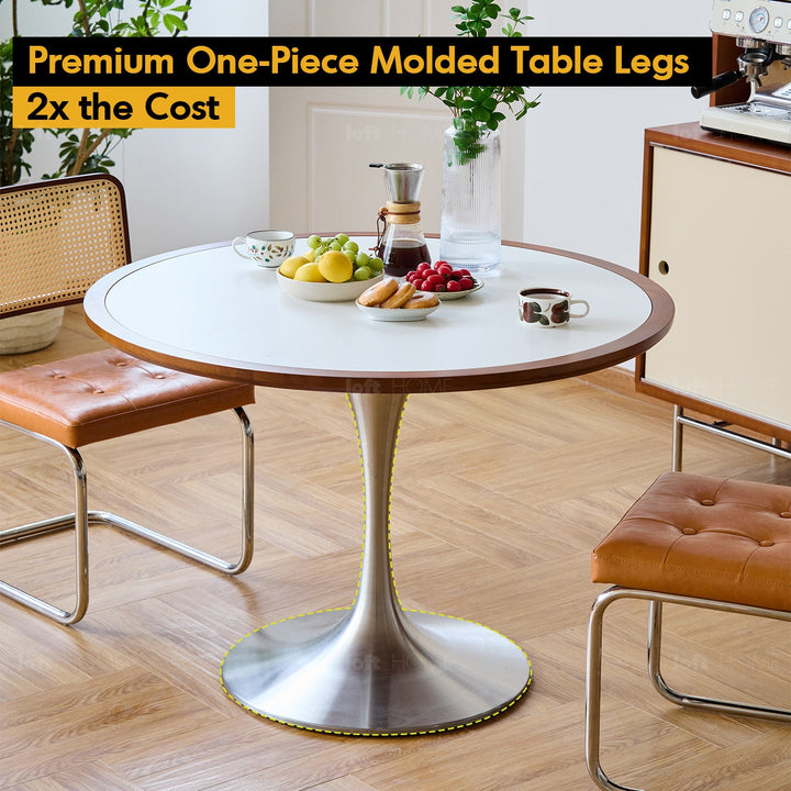 Vintage sintered stone stainless steel round dining table tulip with context.