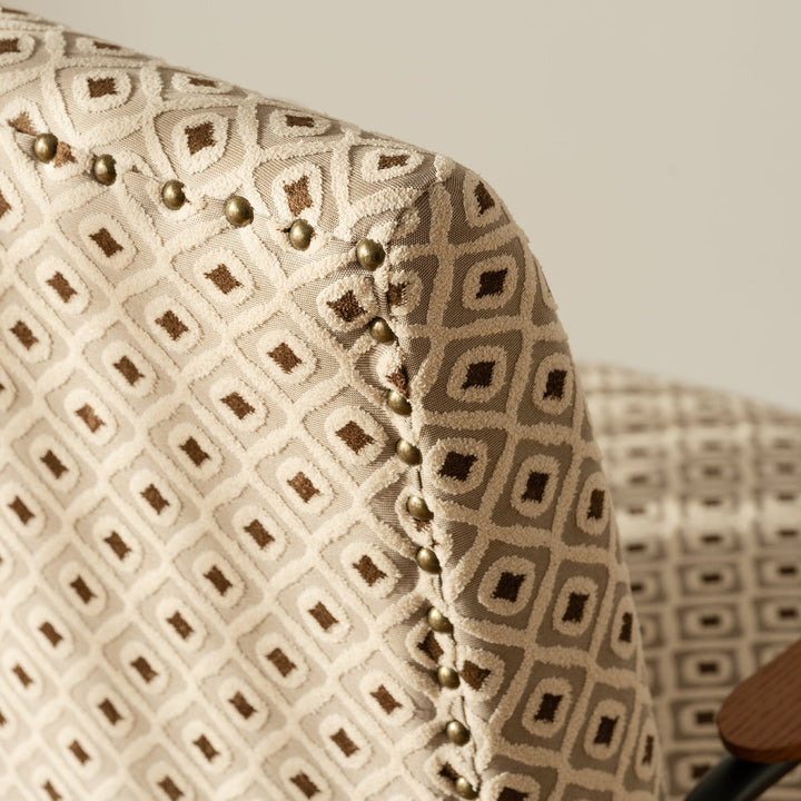 Vintage mixed weave fabric 1 seater sofa wheat in still life.