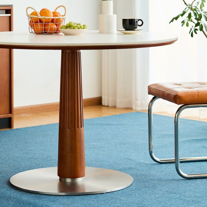 Bauhaus sintered stone round dining table grey color swatches.