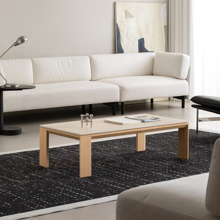 Minimalist ash wood veneer sintered stone coffee table string in panoramic view.