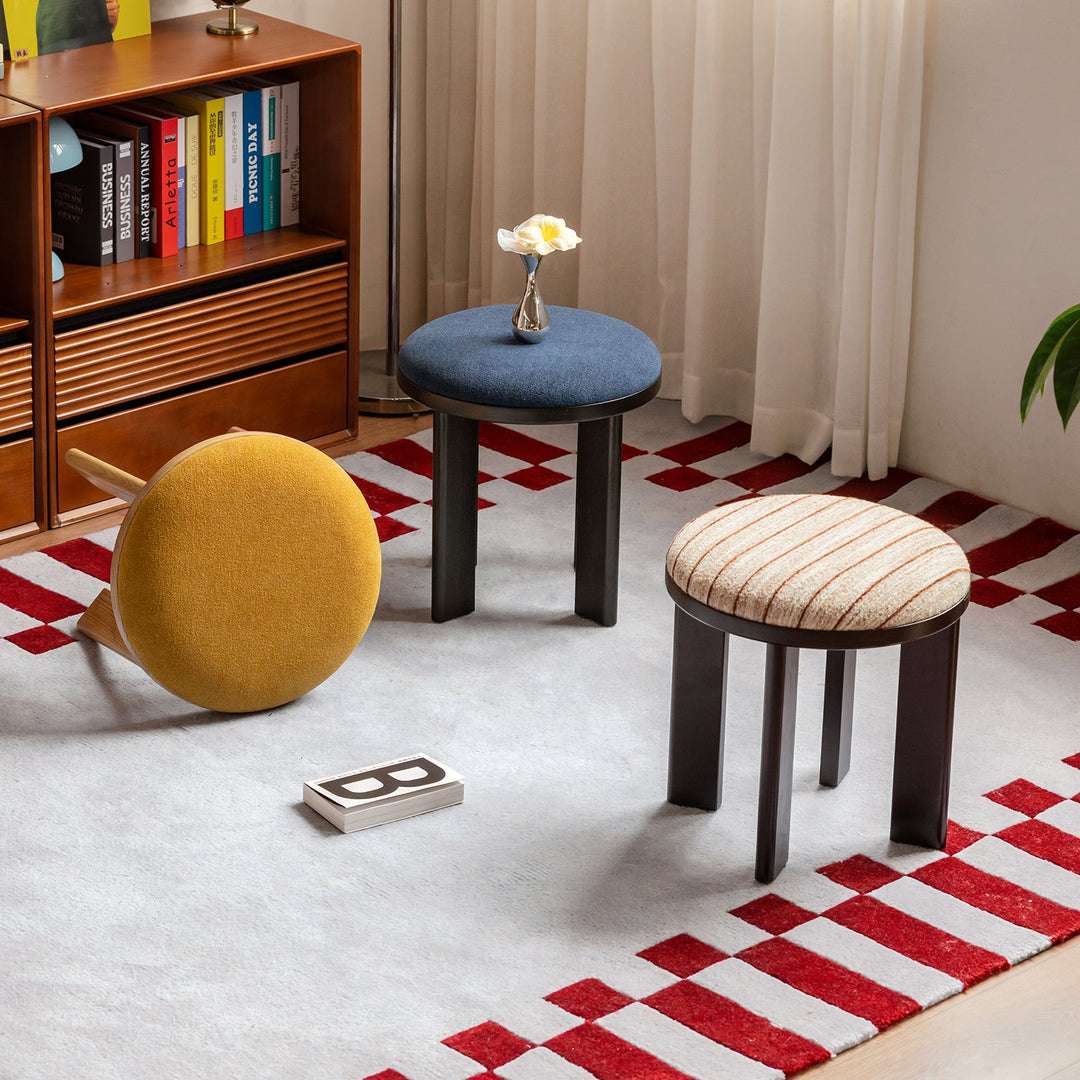 Bauhaus ash wood boucle fabric stool orbit primary product view.