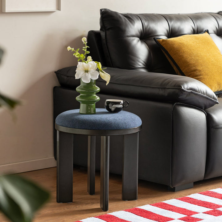 Bauhaus ash wood boucle fabric stool orbit layered structure.