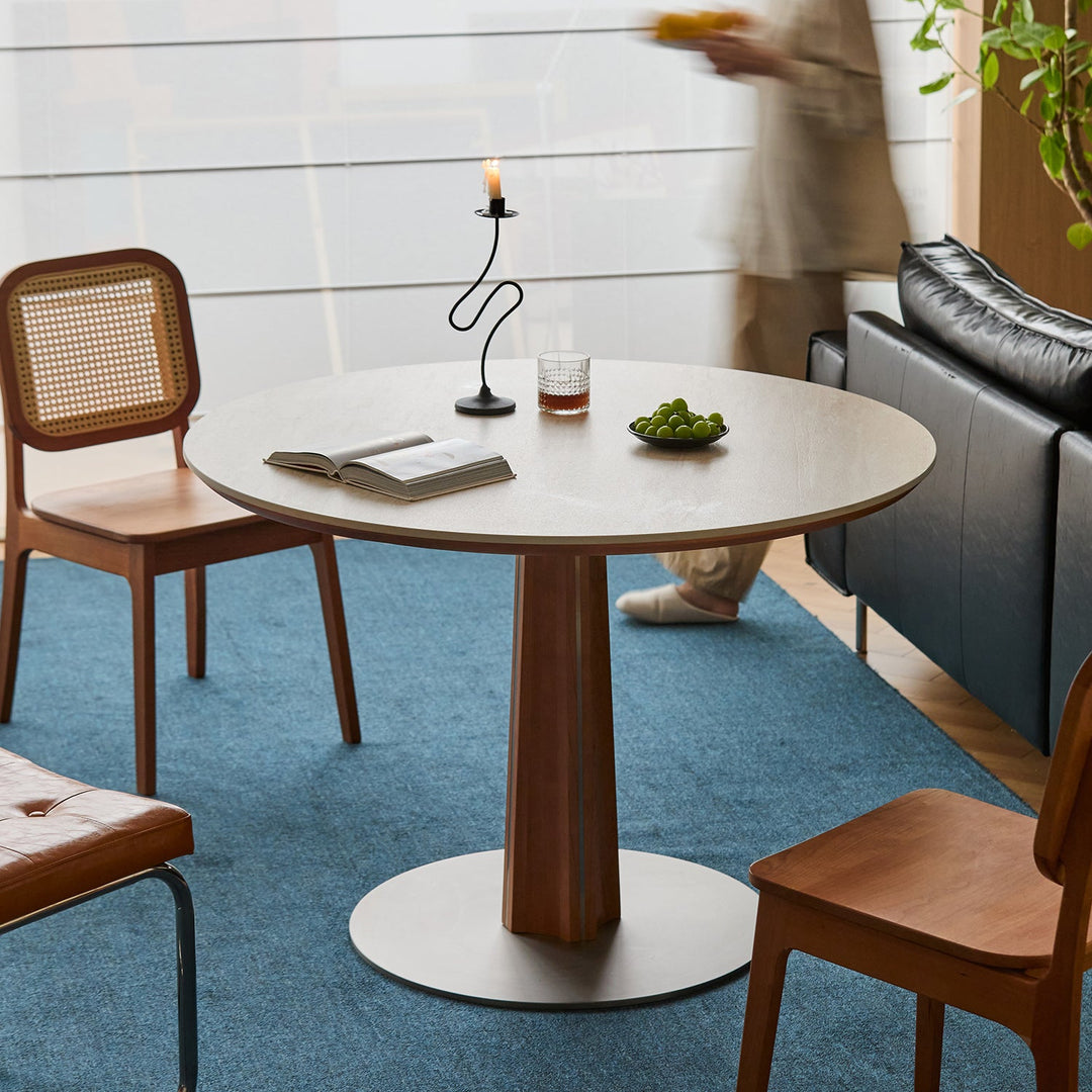 Bauhaus cherry wood sintered stone round dining table pinecone material variants.