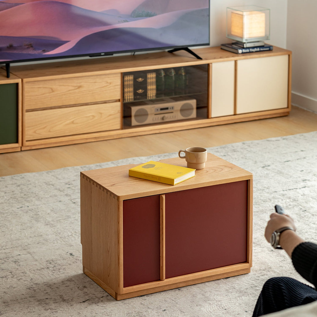 Bauhaus cherry wood tv console time with context.