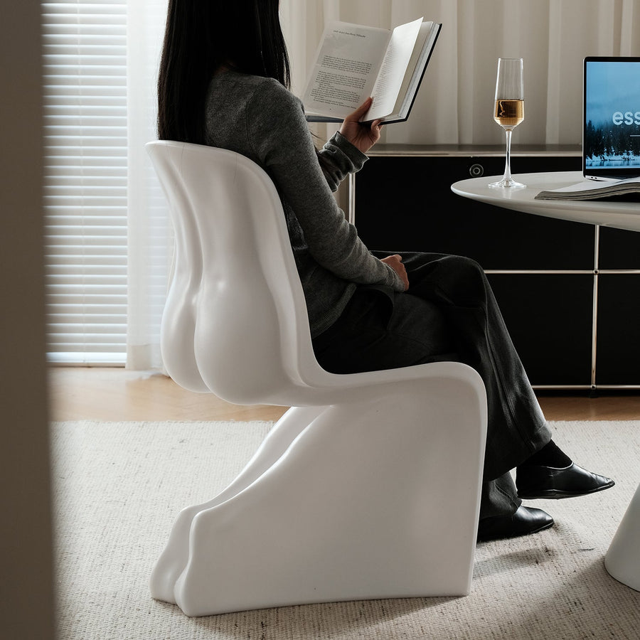 Bauhaus plastic dining chair her primary product view.