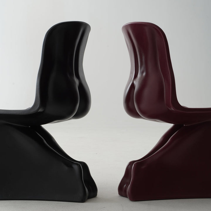 Bauhaus plastic dining chair her in close up details.