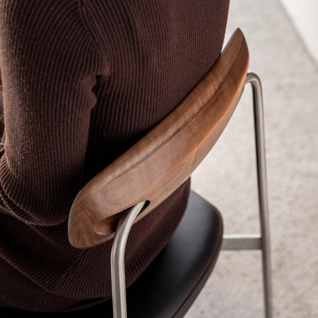 Bauhaus walnut wood dining chair wiener in real life style.