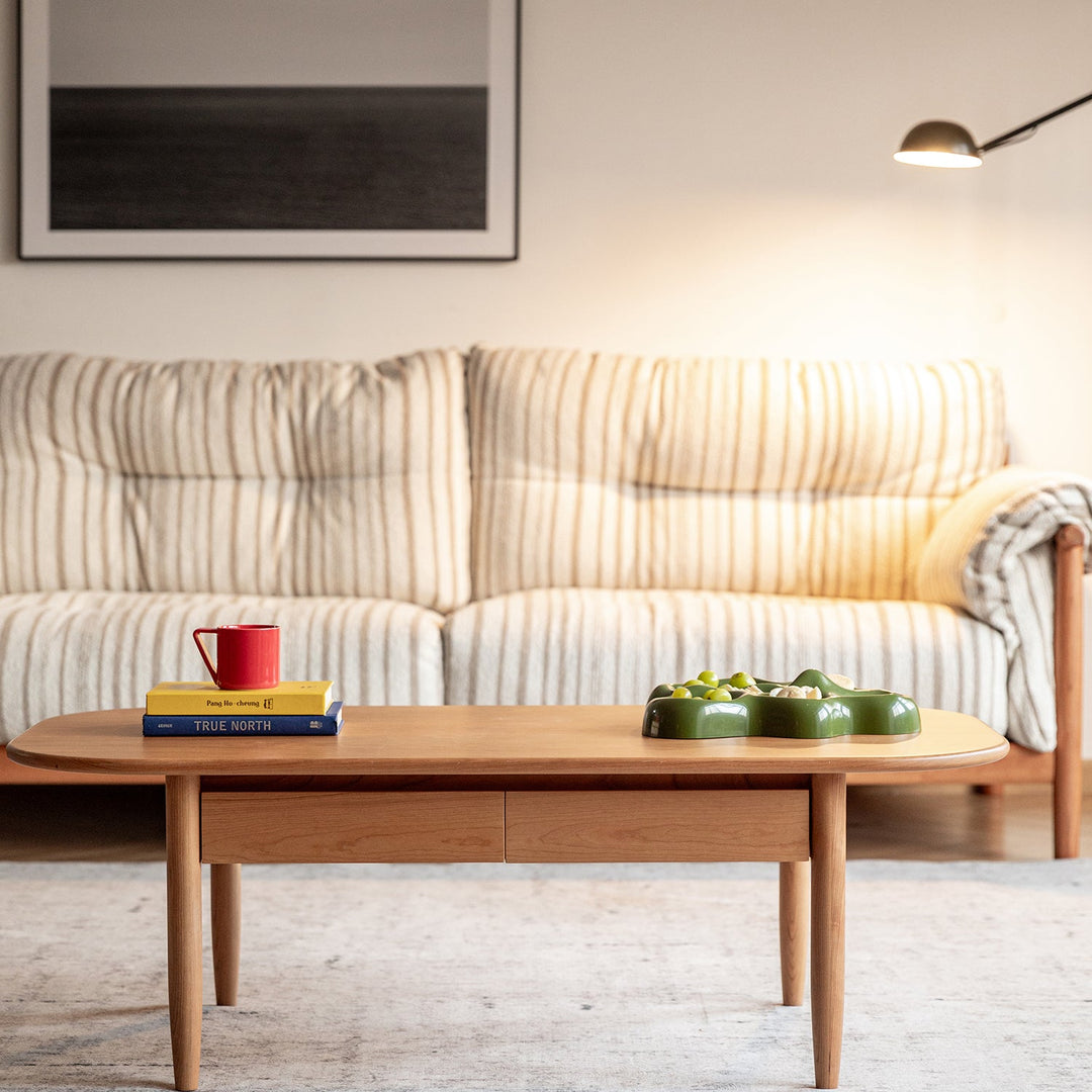 Scandinavian cherry wood coffee table vista in close up details.
