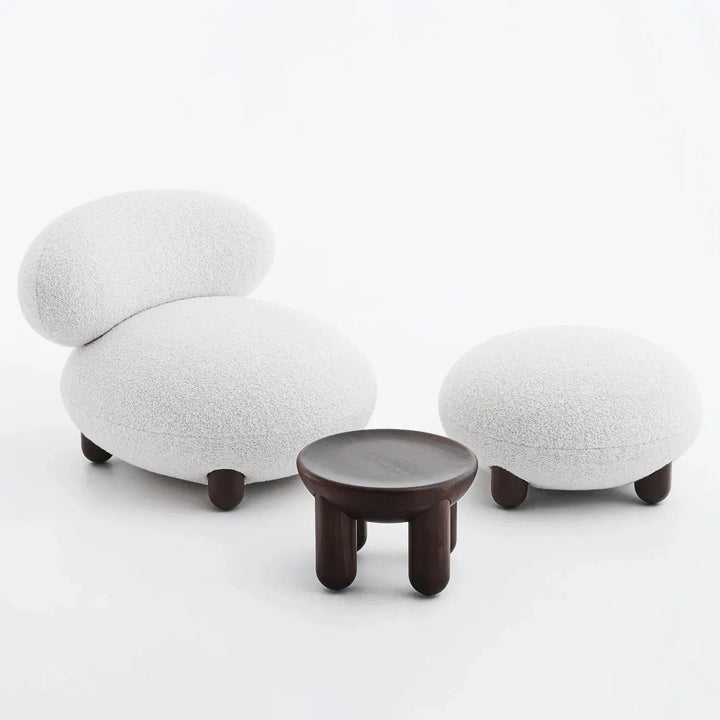 Cream fabric ottoman teddy in panoramic view.