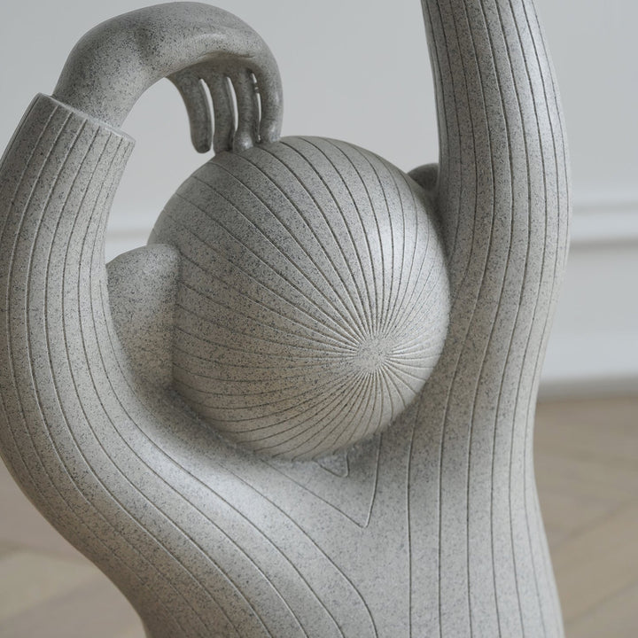 Contemporary fiberglass side table monkey in still life.