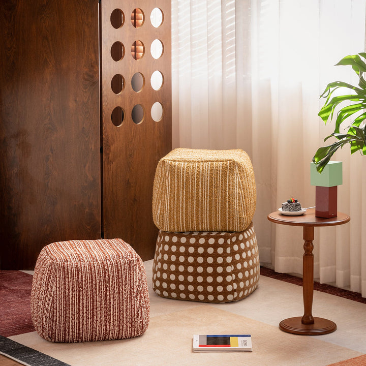 Cream boucle fabric ottoman carry in close up details.