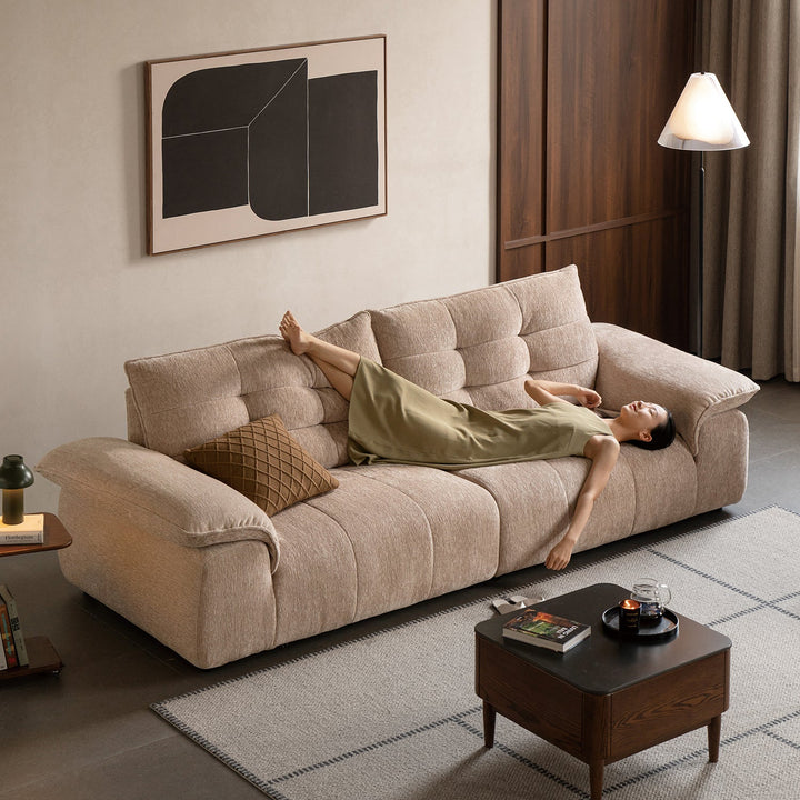 Cream chenille velvet fabric 4 seater sofa coconut with context.