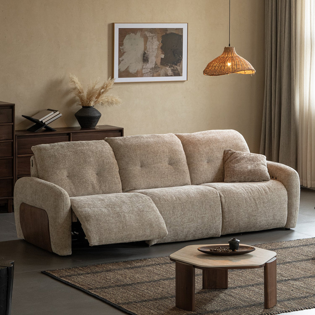 Cream chenille velvet fabric recliner 3 seater sofa mellow in panoramic view.