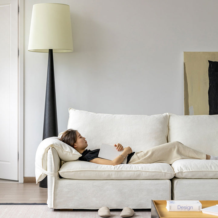 Cream cotton fabric 2 seater sofa folding ear size charts.