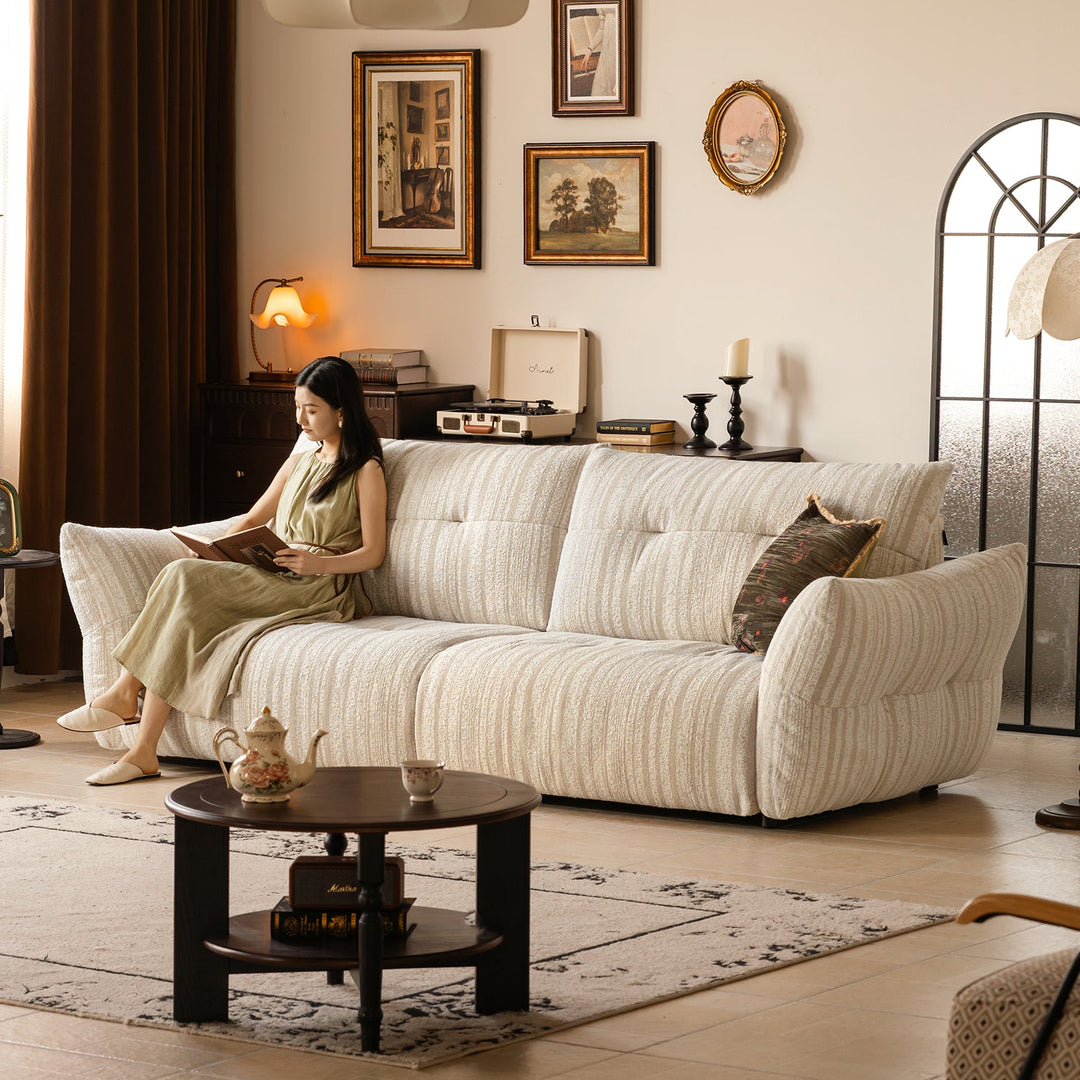 Cream fabric 4 seater sofa mochi primary product view.