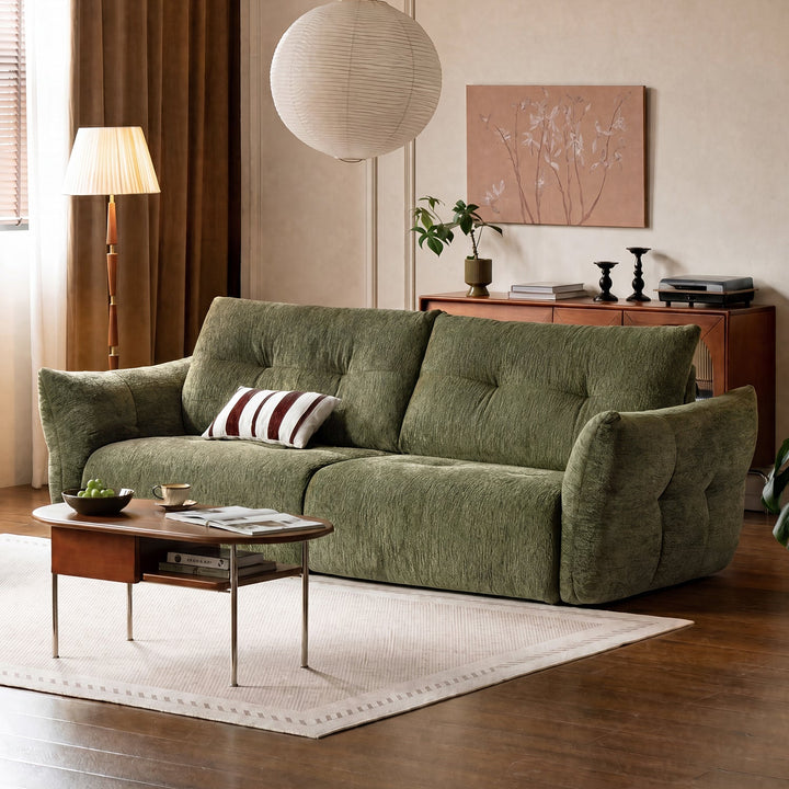 Cream fabric 4 seater sofa mochi in still life.