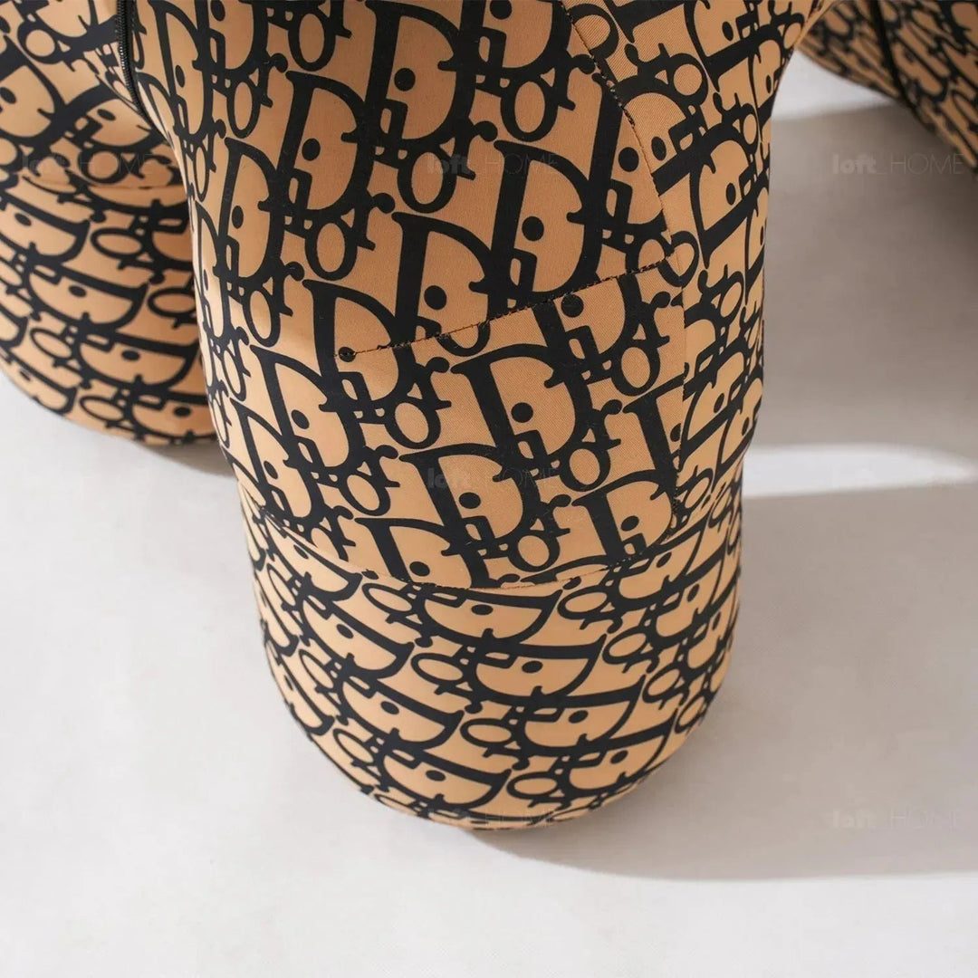 Contemporary polyethylene decor ottoman llama calf in close up details.
