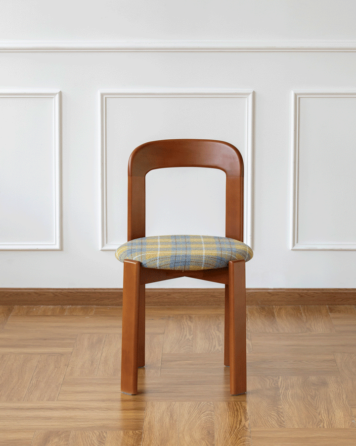 Bauhaus wool fabric beech wood dining chair memphis in panoramic view.
