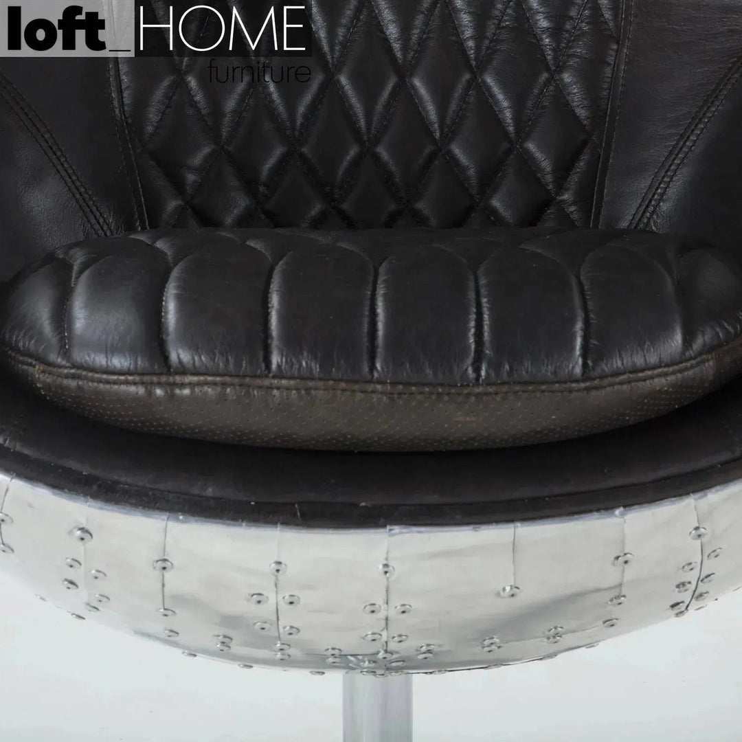 Industrial aluminium 1 seater sofa egg in still life.