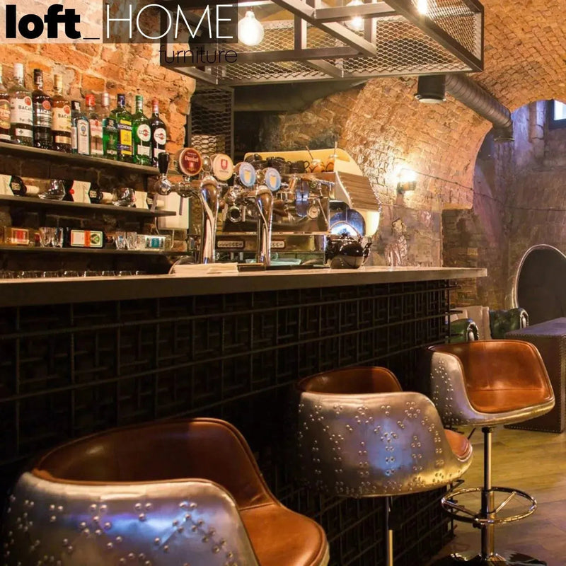 Industrial aluminium genuine leather bar chair aircraft in close up details.