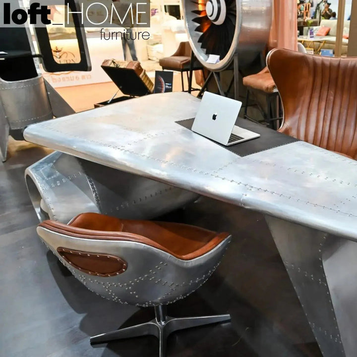 Industrial aluminium study table aircraft engine layered structure.