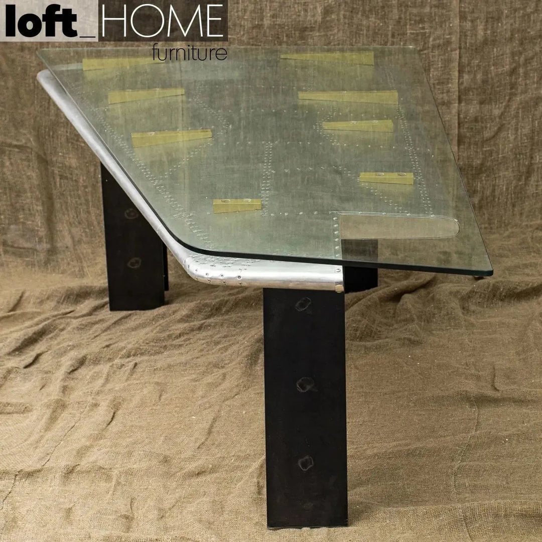 Industrial aluminium tempered glass study table skyway with context.