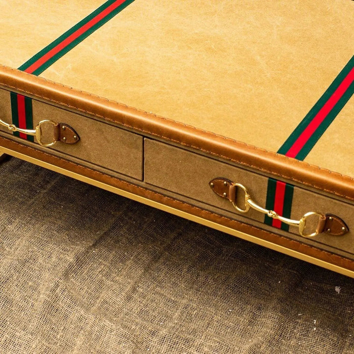 Vintage canvas coffee table guccio with context.