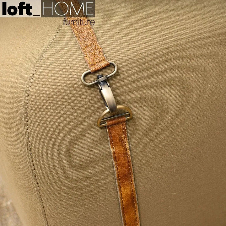 Vintage canvas ottoman stool travel in details.