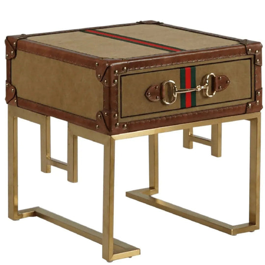 Vintage canvas side table guccio in white background.