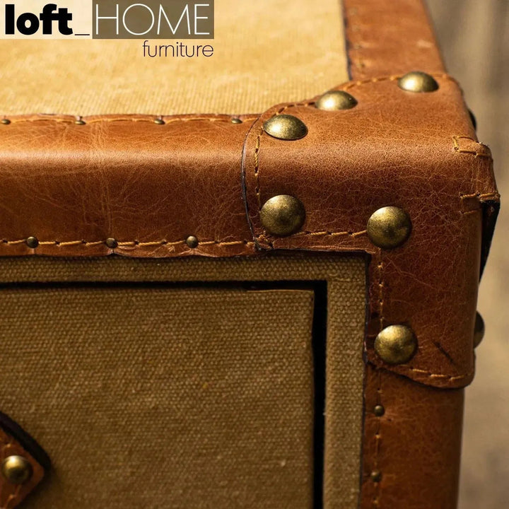 Vintage canvas side table guccio in panoramic view.